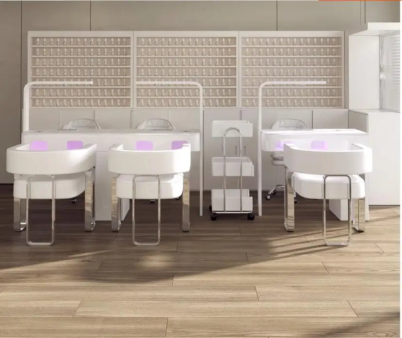 A manicure table and chair set with a second-generation vacuum cleaner and red light grill