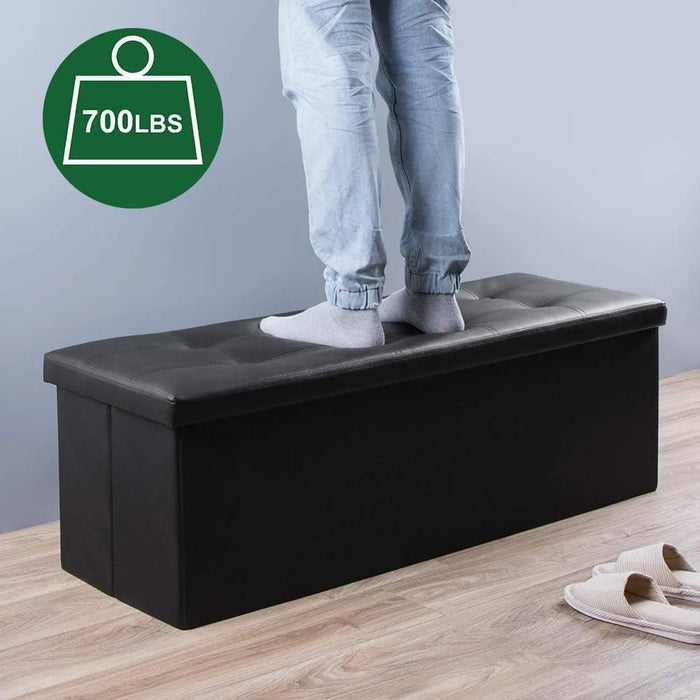 43 Inch Folding Storage Ottoman Bench Cube Hold Up 700lbs with Memory Foam, Black Faux Leather Footrest